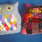 Owl and pussycat cushions, recycled velvet and dressmaking scraps